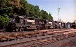 NS 7011, 5077, and 2768 sit with other locos near the fuel rack